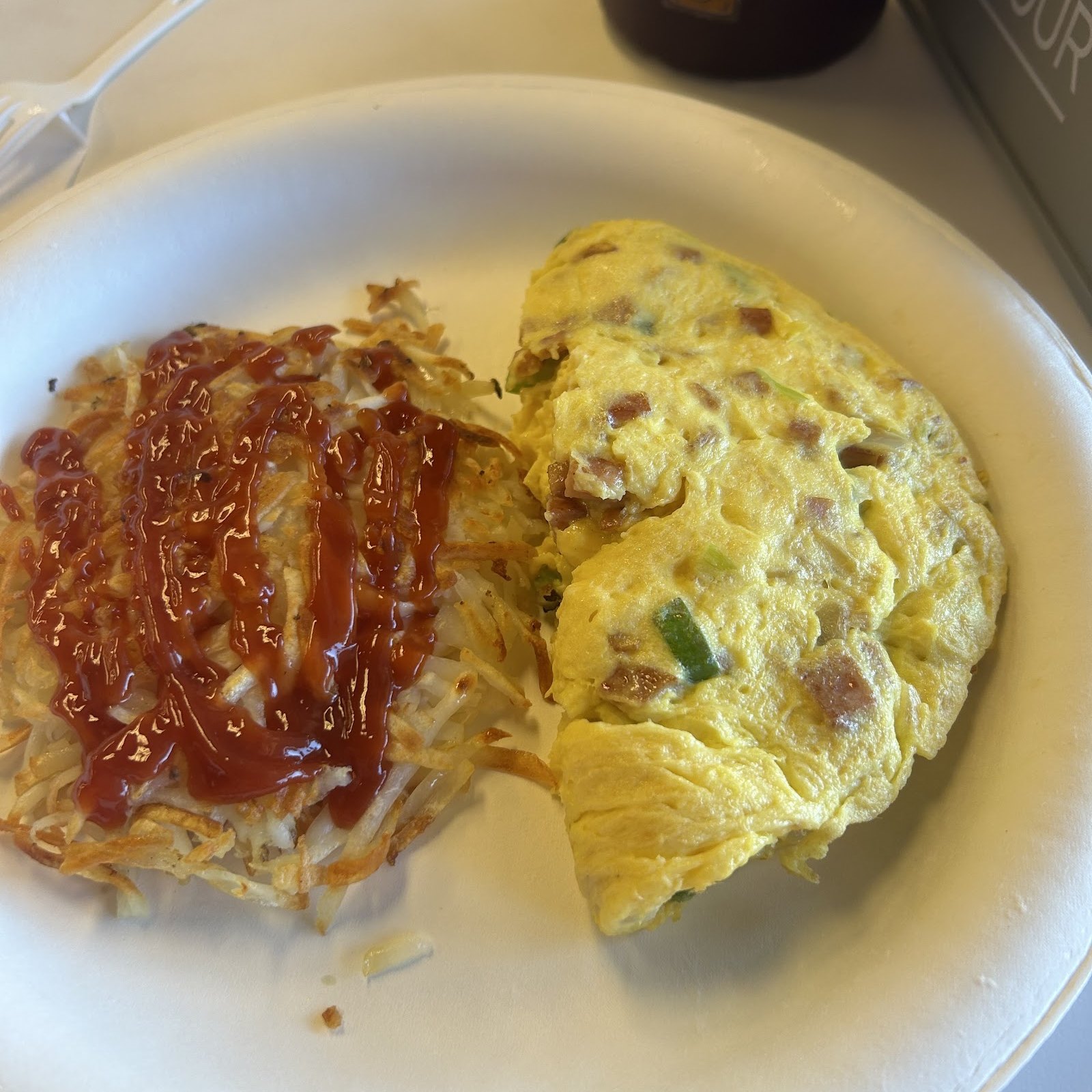 An omelette with hash browns.